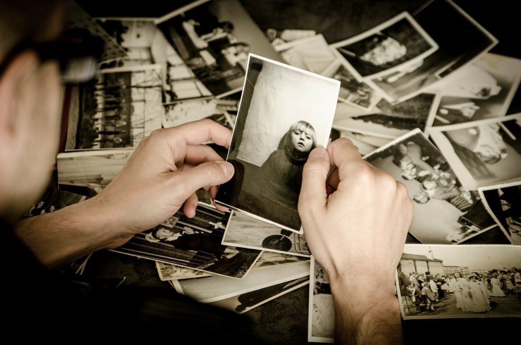 Senior looking at old photos