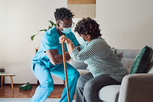 Caregiver helping a resident