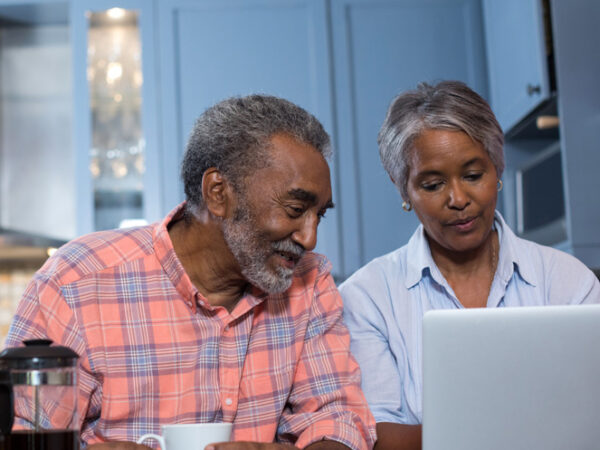 Couple looking at laptop